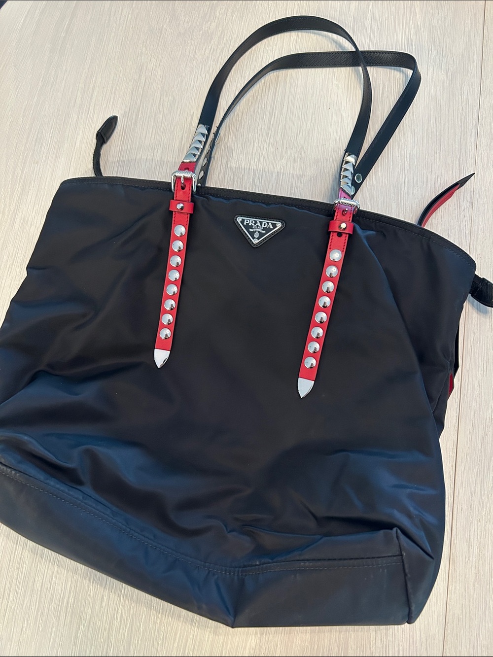 Prada Black Nylon Tote with Red Studded Strap Details